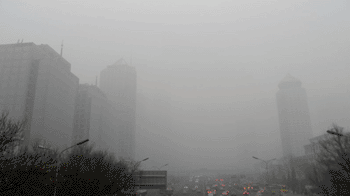 Image: Smog in Beijing central business district (Photo courtesy of Wikimedia Commons). Image: Smog in Beijing central business district (Photo courtesy of Wikimedia Commons).
